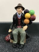 A Royal Doulton china figure : The Balloon Man, HN 1954, height 19 cm.