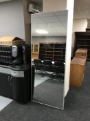 A metal framed mirror