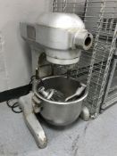 A Hobart commercial stand mixer with attachments