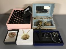 Two boxes containing a collection of costume jewellery