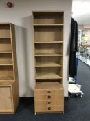 A late 20th century Mobler narrow shelves fitted with four drawers