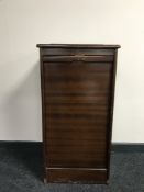 A mahogany music cabinet (locked)