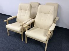Four beech framed high backed-armchairs