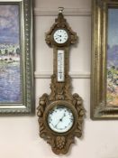 A carved nineteenth century light oak barometer CONDITION REPORT: In good condition.