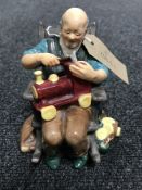 A Royal Doulton figure The Toy Maker HN 2250 CONDITION REPORT: Good condition with