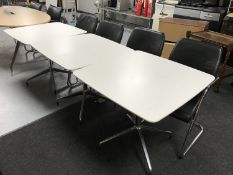 Three Orange Box office tables on chrome legs and four office armchairs