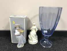 A large decorative blue glass vase,