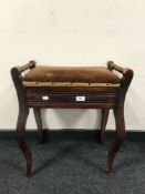 A storage piano stool