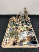 Two trays of assorted figurines, onyx eggs, china flower posies,