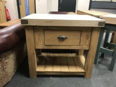 A reclaimed pine butcher's block fitted with a drawer