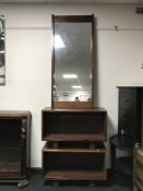 Two rosewood low shelves together with a rosewood framed mirror CONDITION REPORT: