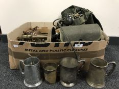A box of assorted clock parts, cameras, tankards,
