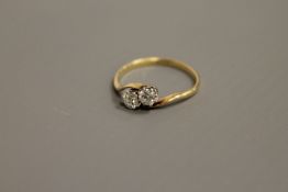 18ct two stone diamond twist ring (old cut) - approximately .
