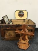 A pine crate of assorted framed prints,