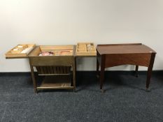 Two mid 20th century sewing trolleys and accessories
