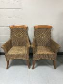 A pair of contemporary wicker armchairs