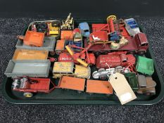 A tray containing a good collection of vintage die cast Dinky vehicles including farm vehicles,