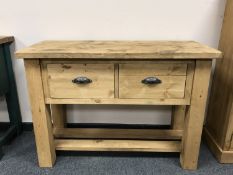 A reclaimed pine farmhouse dresser fitted with two drawers