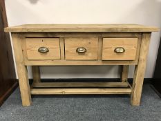 A reclaimed pine sideboard fitted with three drawers