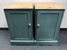 A pair of painted pine single door low cupboards.