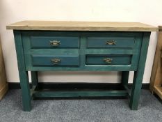 A painted reclaimed pine sideboard fitted with four drawers