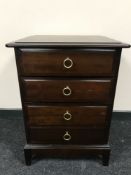 A mahogany Stag Minstrel four drawer chest