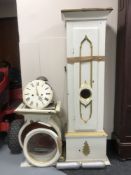 An early 20th century long cased clock with enamelled dial with pendulum and weights (case damaged)