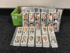 A large quantity of cigarette cards in sleeves
