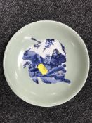 A Chinese Celadon glazed bowl CONDITION REPORT: Fine surface scratches to glaze.