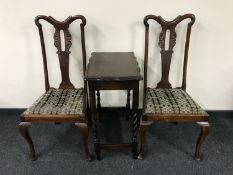 An oak barleytwist occasional table together with a pair of mahogany Queen Anne style chairs