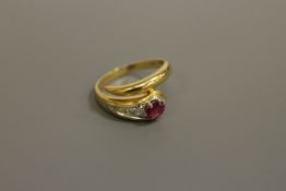 An 18ct gold ruby and diamond snake ring, 4.