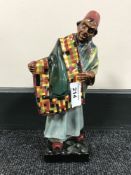 A Royal Doulton china figure : Carpet Seller, HN 1464, height 23 cm.