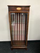 A Victorian inlaid mahogany glazed door display cabinet