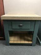 A painted pine butcher's block fitted with a drawer