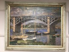 An Artagraph reproduction : Boats by a bridge, framed.