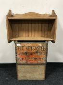 A vintage Newcastle Breweries wooden beer crate together with a small pine box and a pine wall