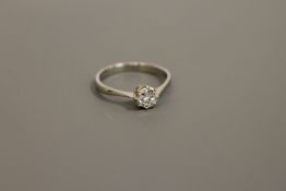 A platinum diamond solitaire ring CONDITION REPORT: Approximately 0.5 carat.