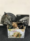 A box of ornaments, binoculars, parasols,