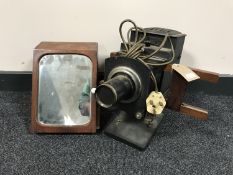 An Ensign Optiscope number 6 and a small mirrored cabinet