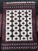 A fringed Turkish Kilim rug