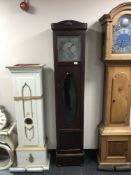 A longcase clock with silvered dial - no pendulum or weights