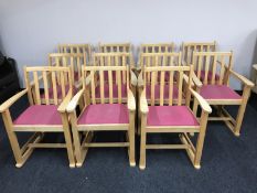 A set of eleven contemporary beech armchairs