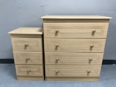 A beech effect four drawer chest together with matching three drawer bedside chest