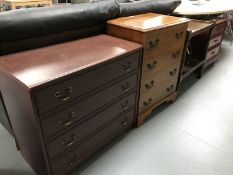 A mahogany effect bedside chest, five drawer chest,