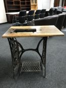 A treadle sewing machine table