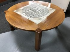 A late 20th century Danish teak tiled topped coffee table