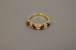An 18ct gold ruby and diamond ring