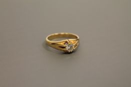 A diamond solitaire ring, the brilliant cut stone weighing an estimated 0.