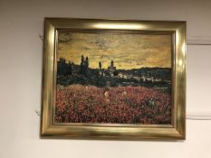 An Artagraph reproduction : Poppy field with village beyond, framed.