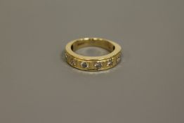 18ct half eternity ring with eight stones 5.